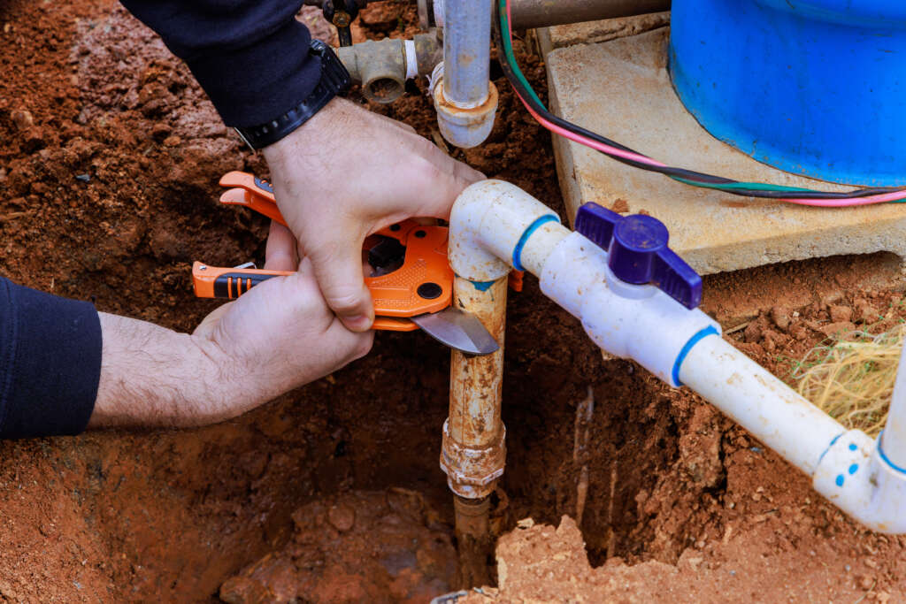 Cutting plastic PVC pipe
