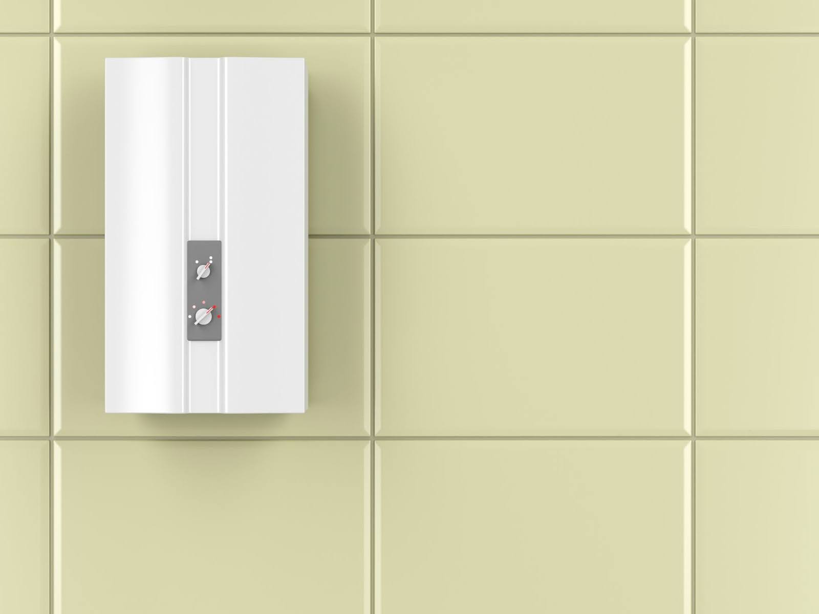 A sleek tankless hot water heater mounted on the bathroom wall.