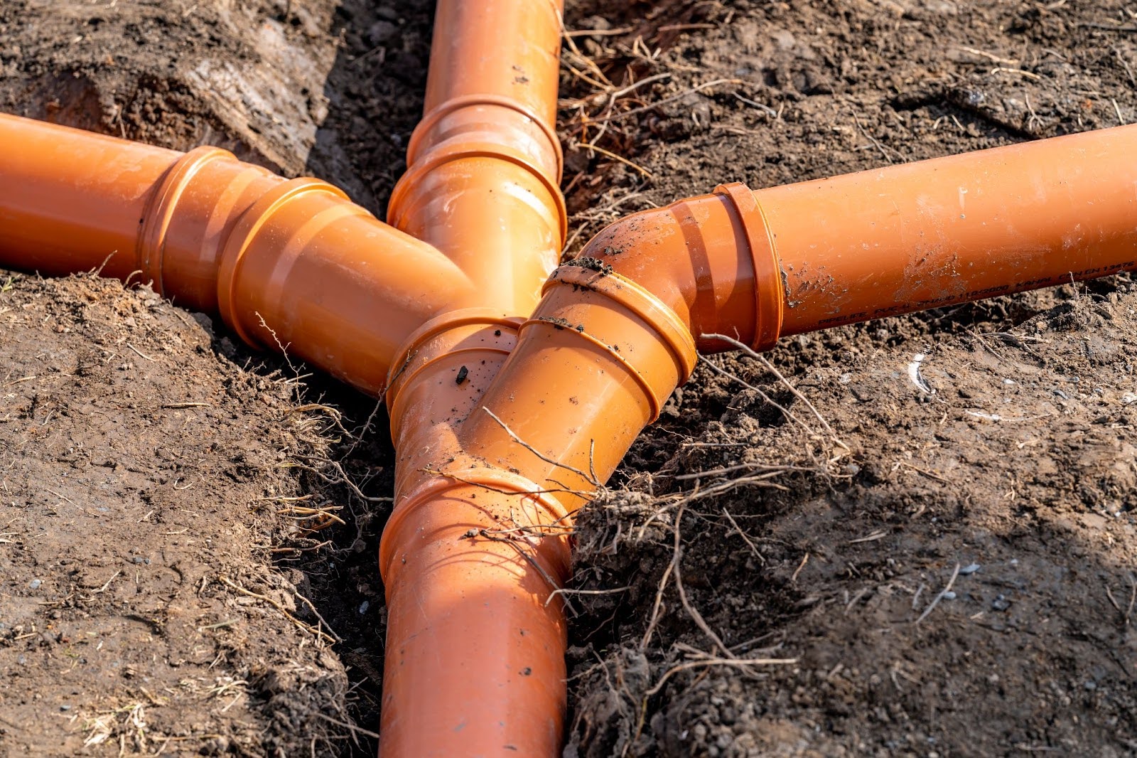 A plastic pipe for the sewage network in the residential base plate.