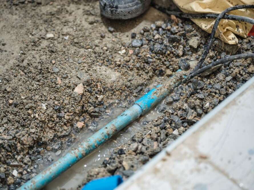 A leaky sewer line surfaces during a construction job.